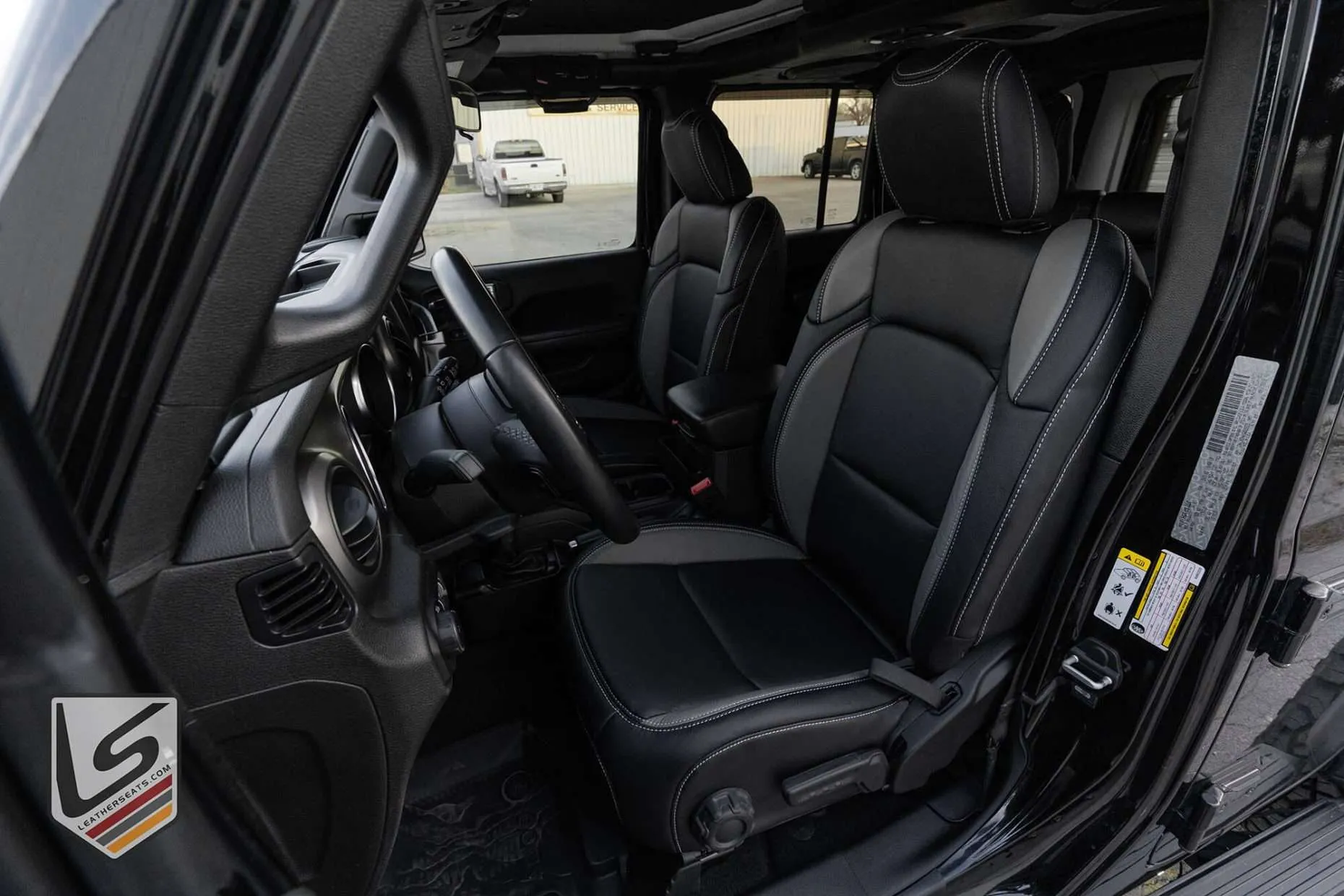 2018-2022 Jeep Wrangler JL with custom leather seats - Installed front driver seat in Black and Light Greu