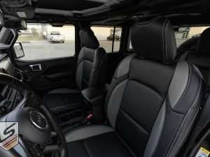 Backrest and headrest section of driver seat - Black with Light Grey wings