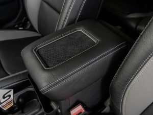 Close-up from driver side - QI Qireless phone charging console