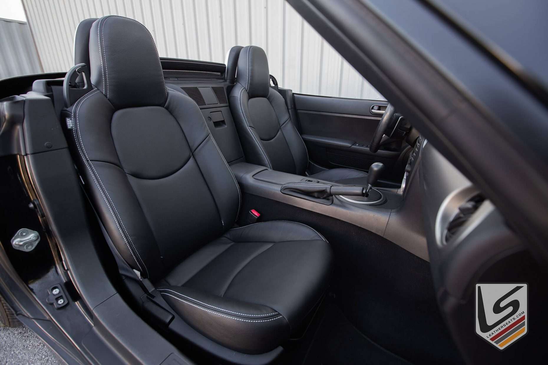 MAzda Miata with custom Black leather seats - Passenger side view