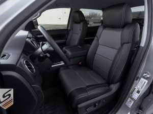 Toyota Tundra CrewMax with custom two-tone leather seats in Black with Charcoal Body - Front driver seat