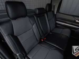 Passenger side rear backrest and headrest section