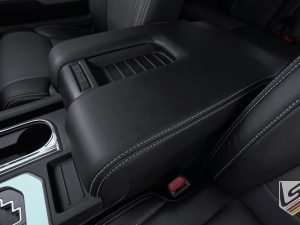 Contrasting Silver stitching on console lid cover