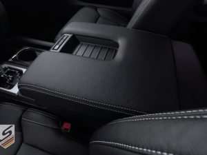 Driver side view of leather console lid cover