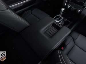 Top-down passenger view of custom console lid cover