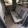 LeatherSeats.com custom two-tone Ford F-150 interior - Rear seats from driver's side
