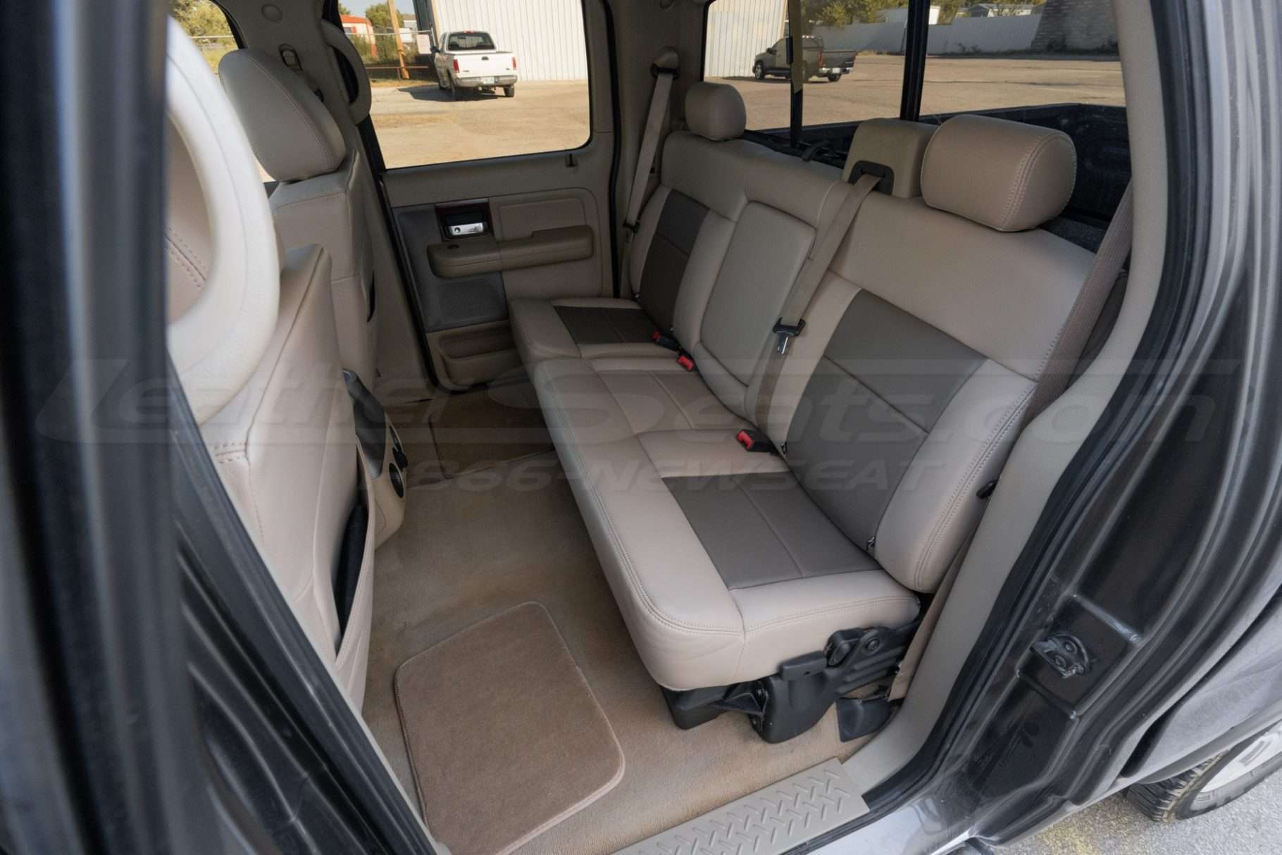 LeatherSeats.com custom two-tone Ford F-150 interior - Rear seats from driver's side