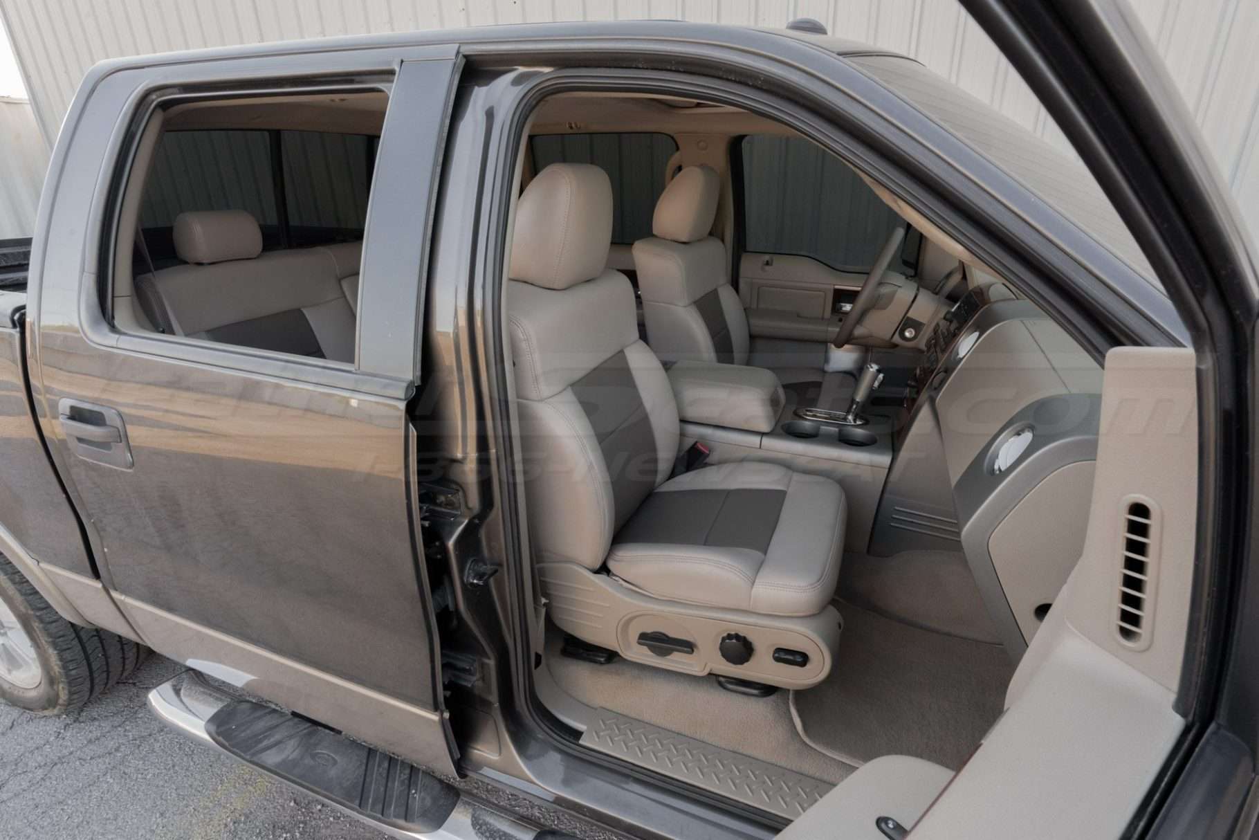 Wide view of front passenger seat with Adobe and Driftwood leather