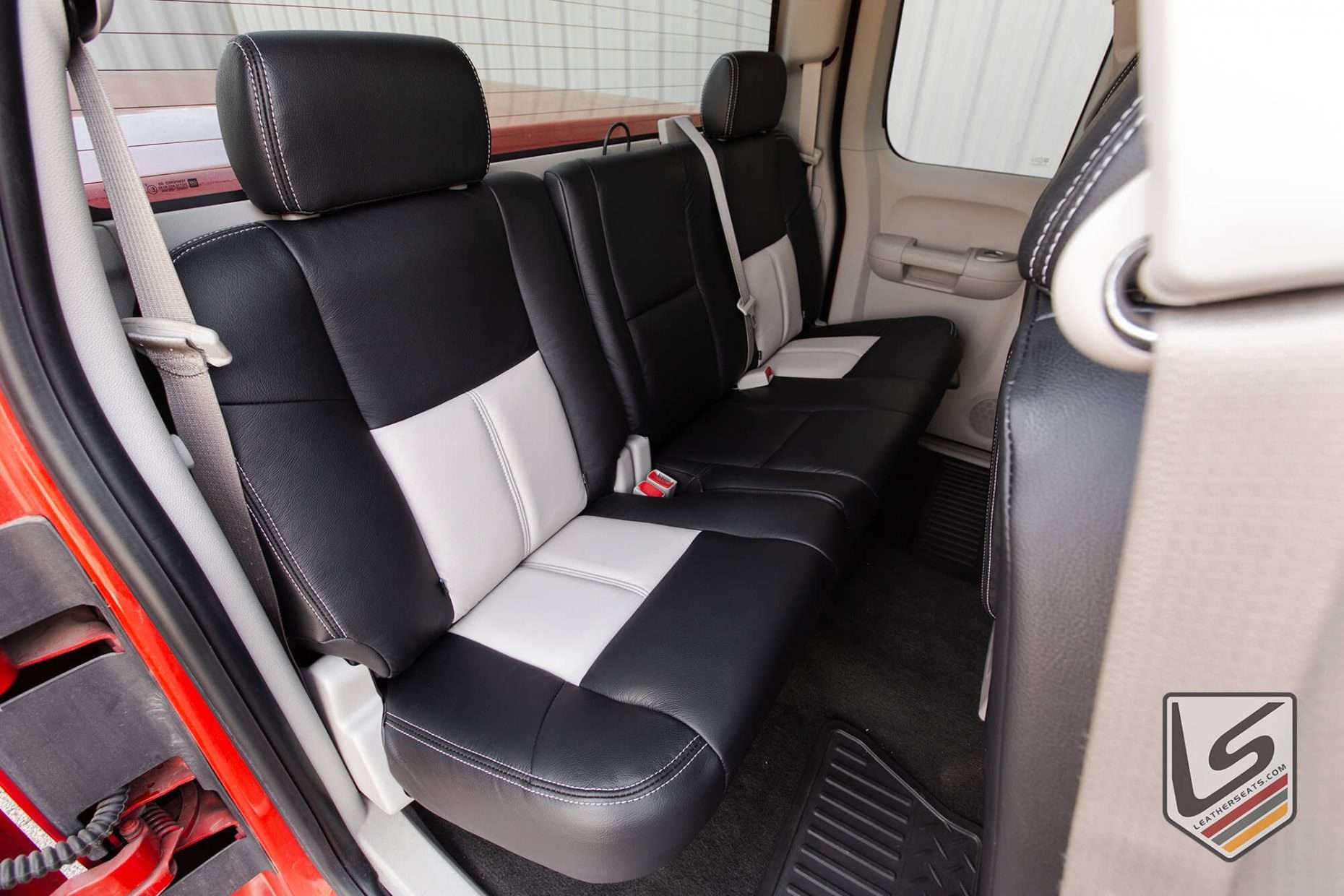 2007-2013 Chevrolet silverado with custom leatherseats.com interior - Rear seat from passenger side
