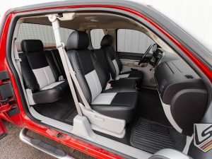 Wide angle view of front and rear leather Chevy Silverado seats