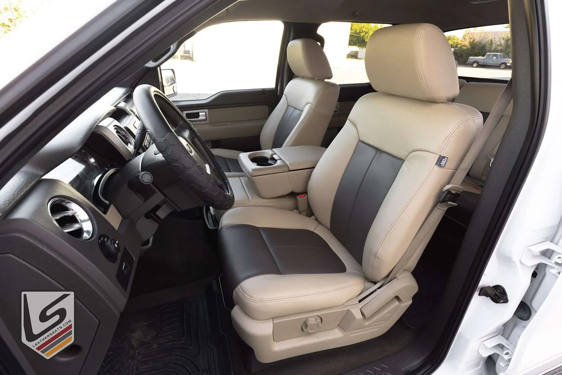 Ford F-150 SuperCrew XLT with custom Sandstone andJava leather seats - front driver seat