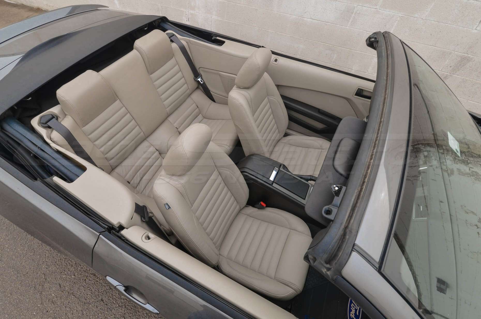 Aerial view from passenger side of Ford Mustang with Beach leather seats
