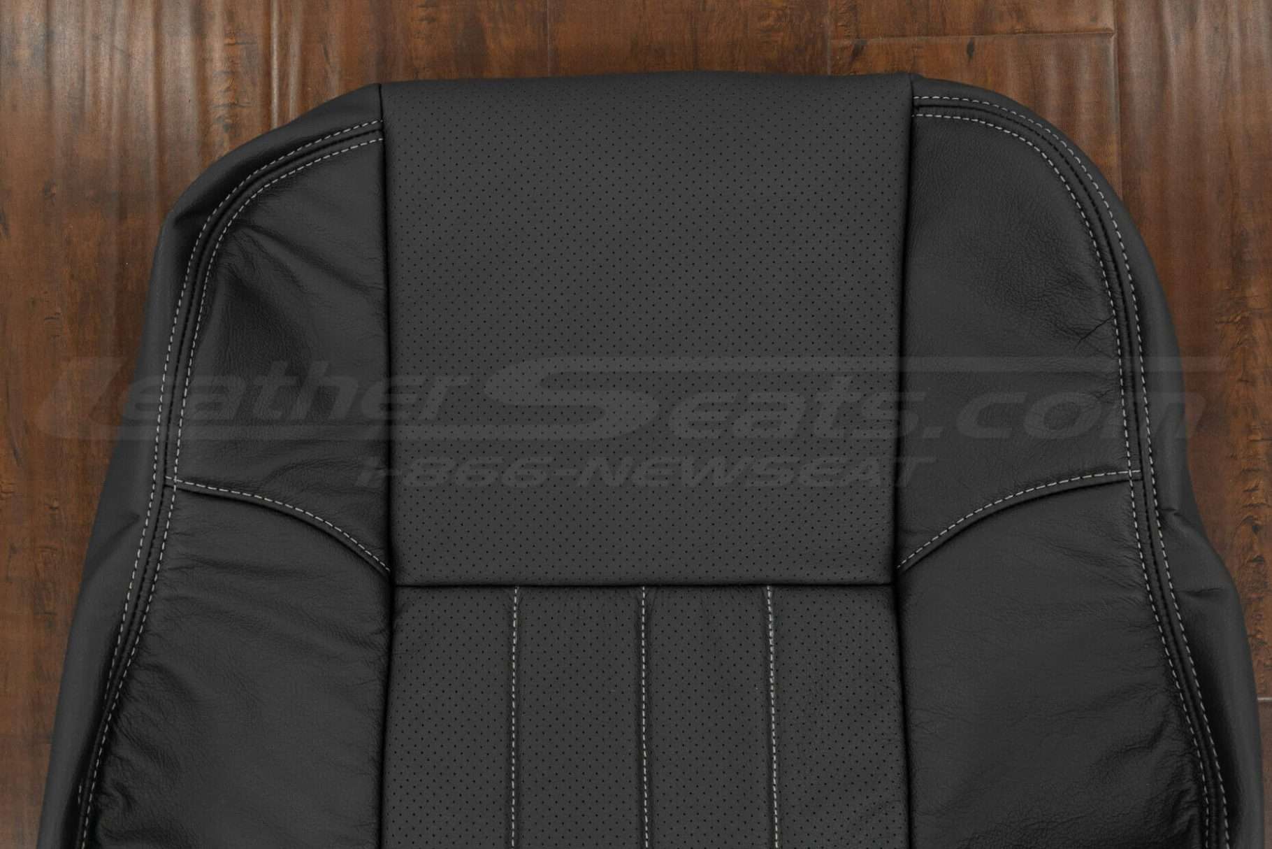 Upper section of backrest upholstery