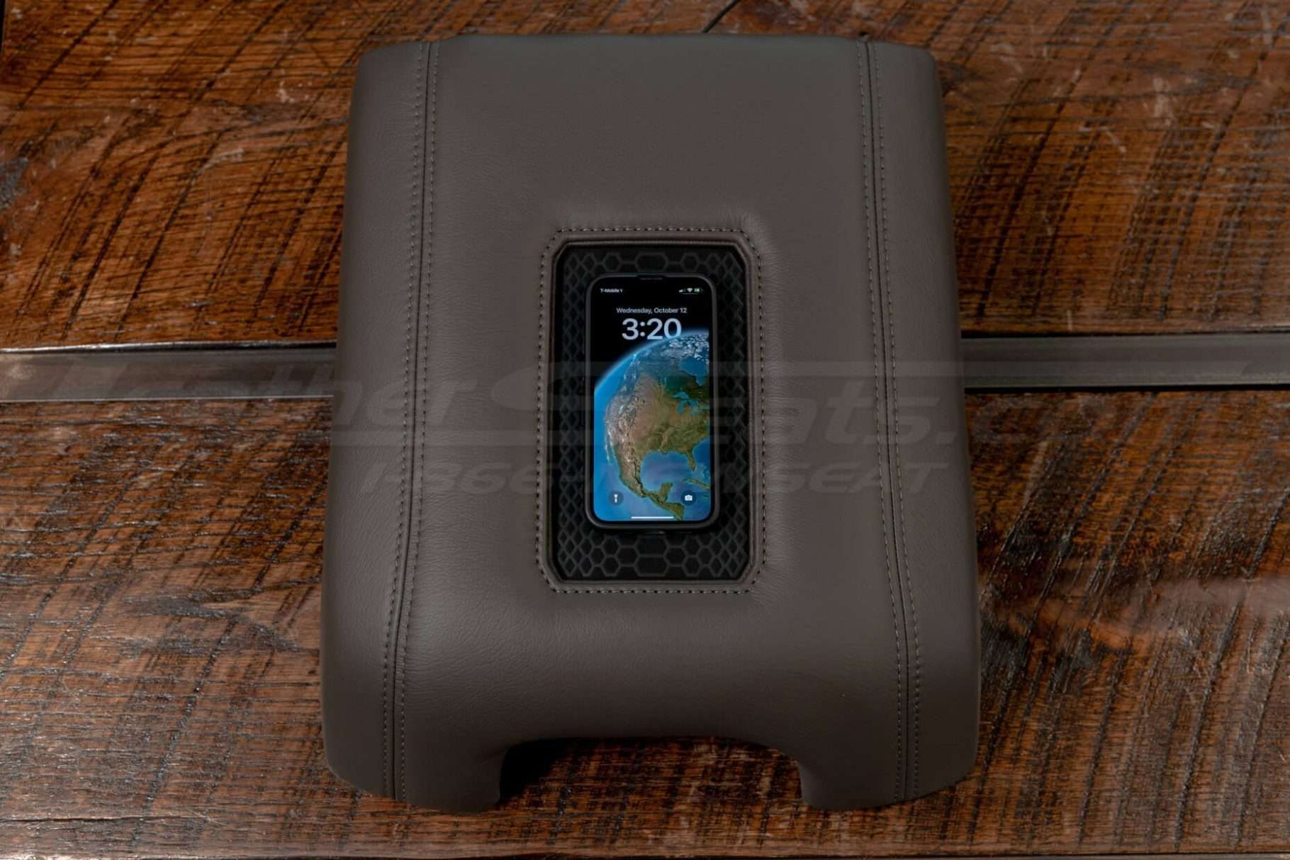 Wireless Charging Console charging an iPhone mini