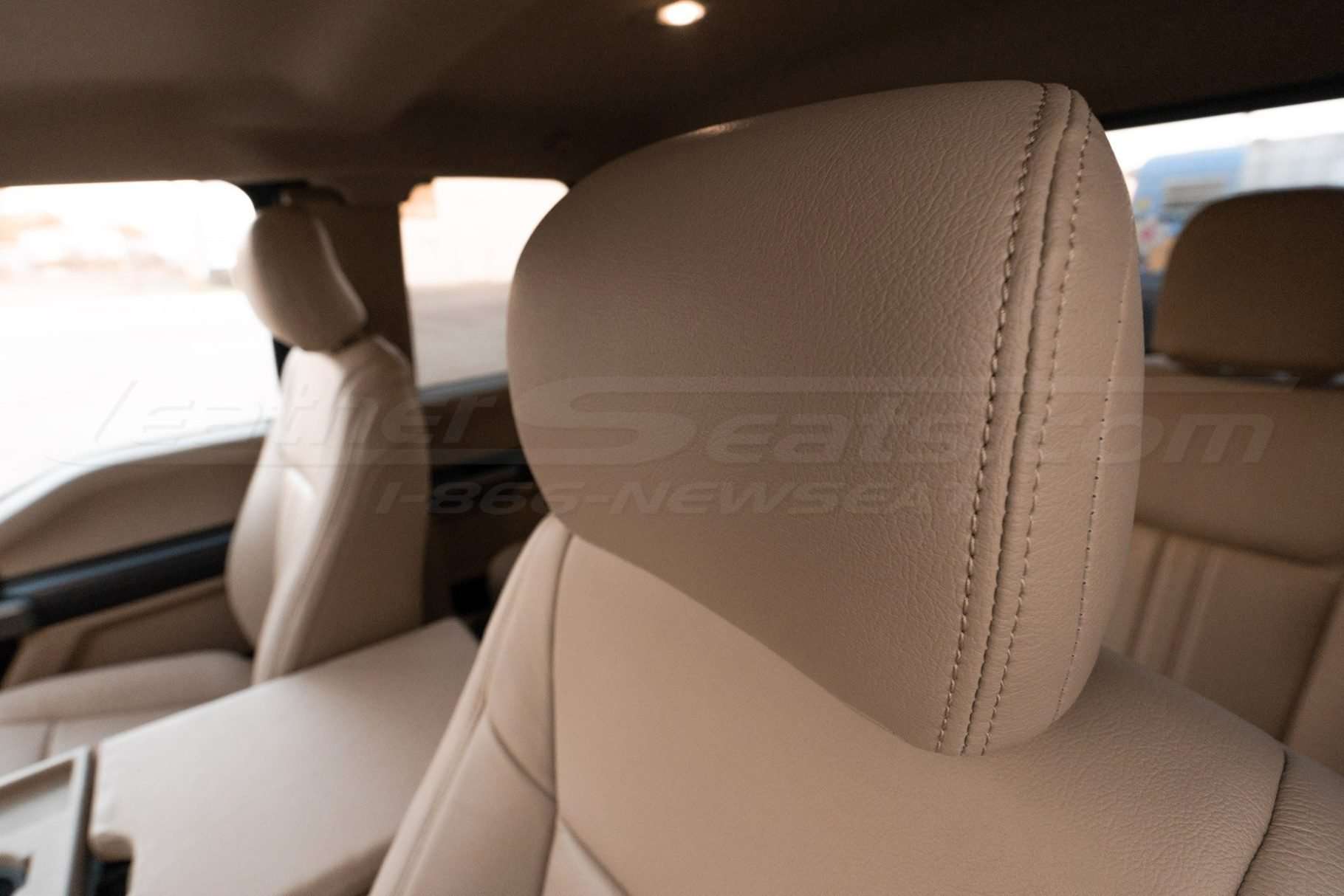 Bisque leather headrest upholstery installed