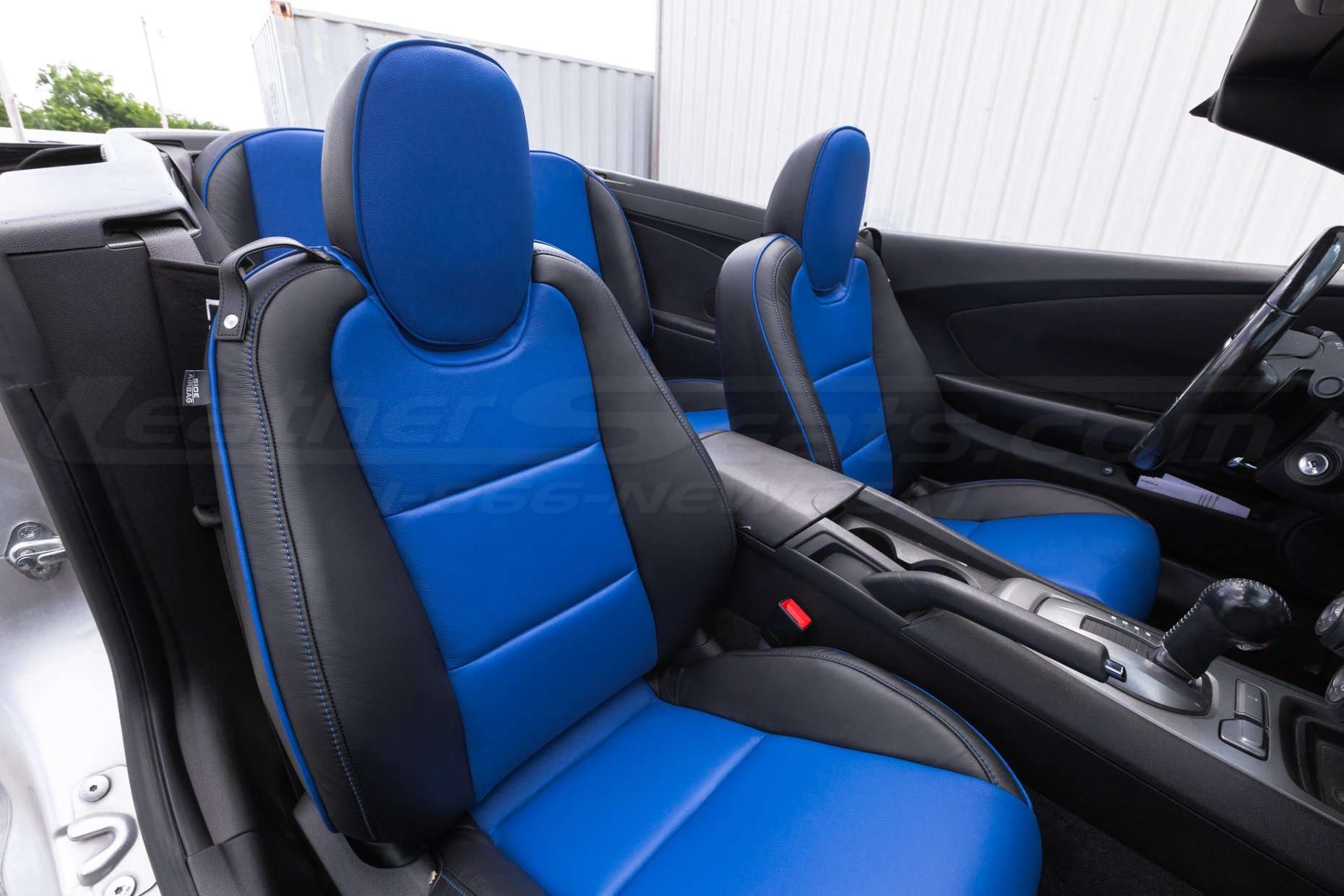 Backrest and headrest section of front passenger Camaro with custom leather seats