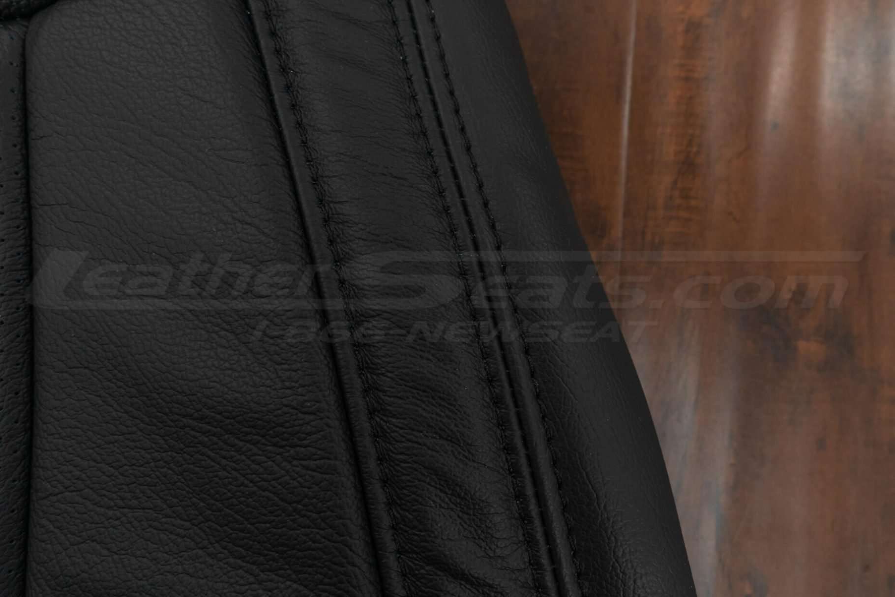 Black double-stitching on backrest