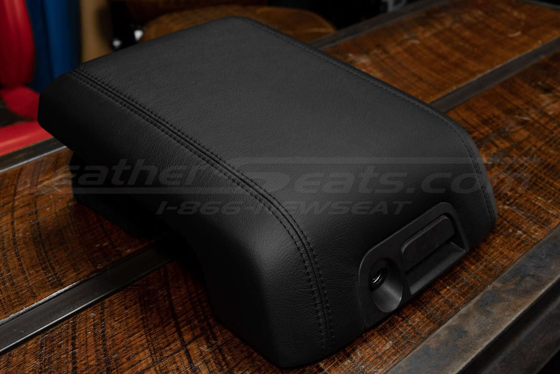 Low side view of Black leather console lid for Ford SuperDuty