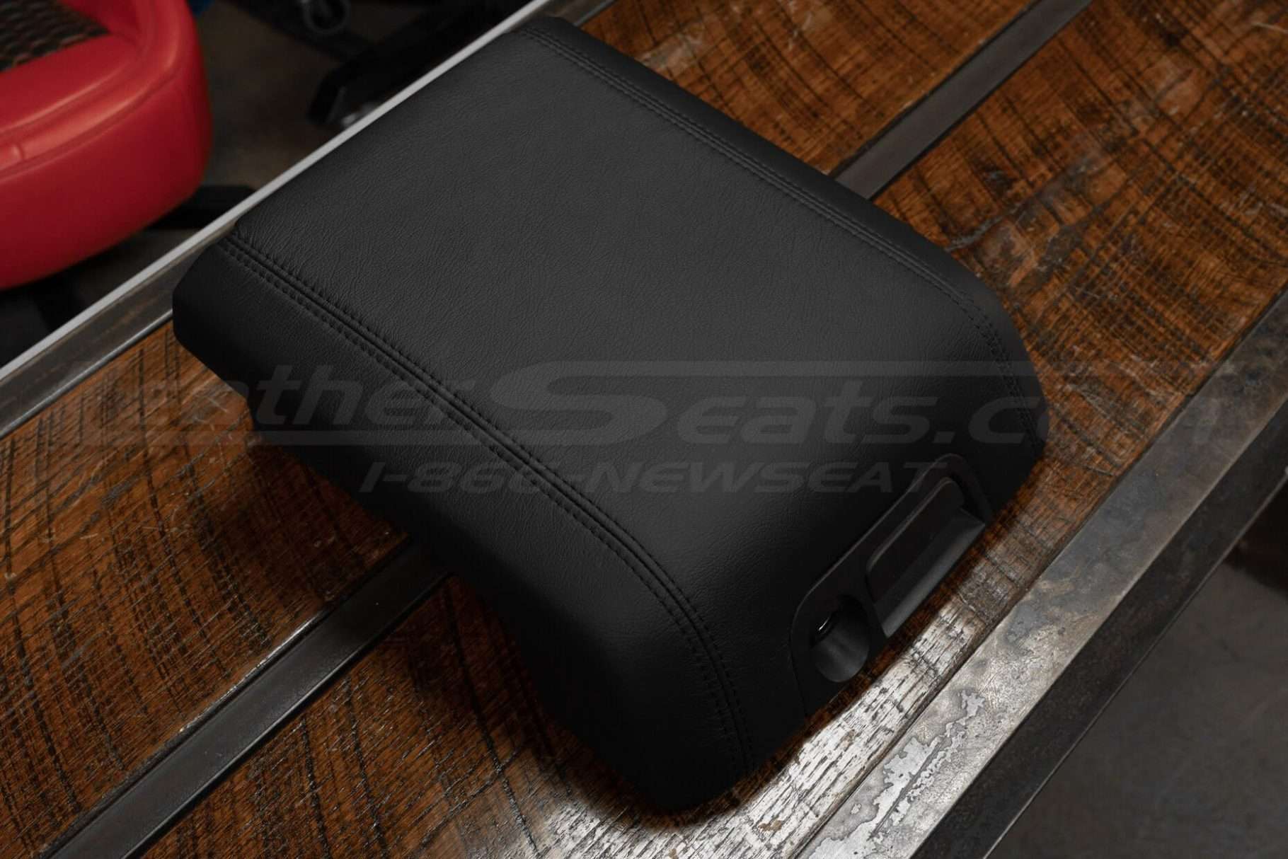 Top-down side view of console lid cover