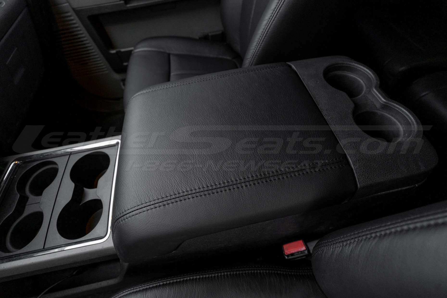 close-up of installed leather console lid cover - driver's side