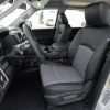 Two-Tone Dodge Ram leather seats in Black & Lapis - Front seat with middle seat down