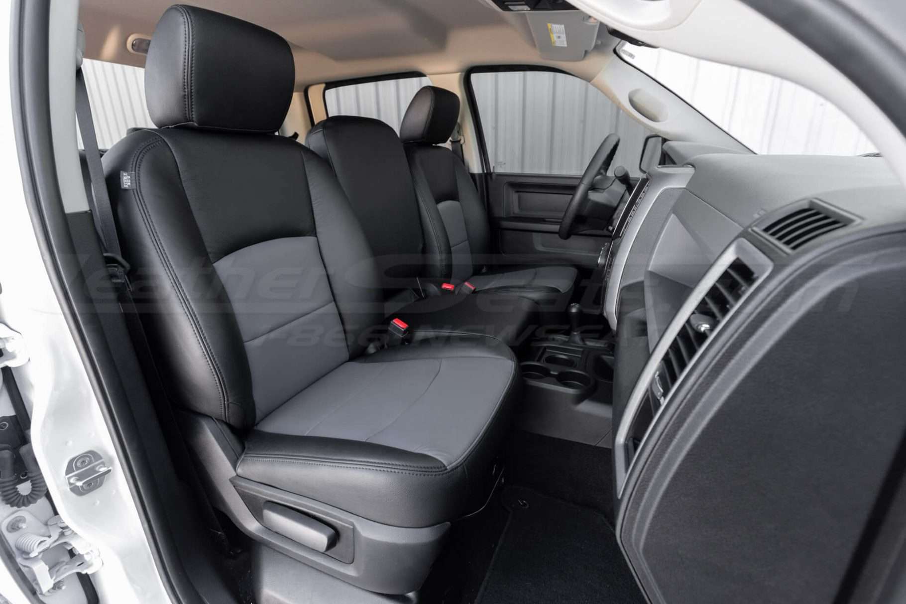 Front passenger Dodge Ram leather seats with middle seat up