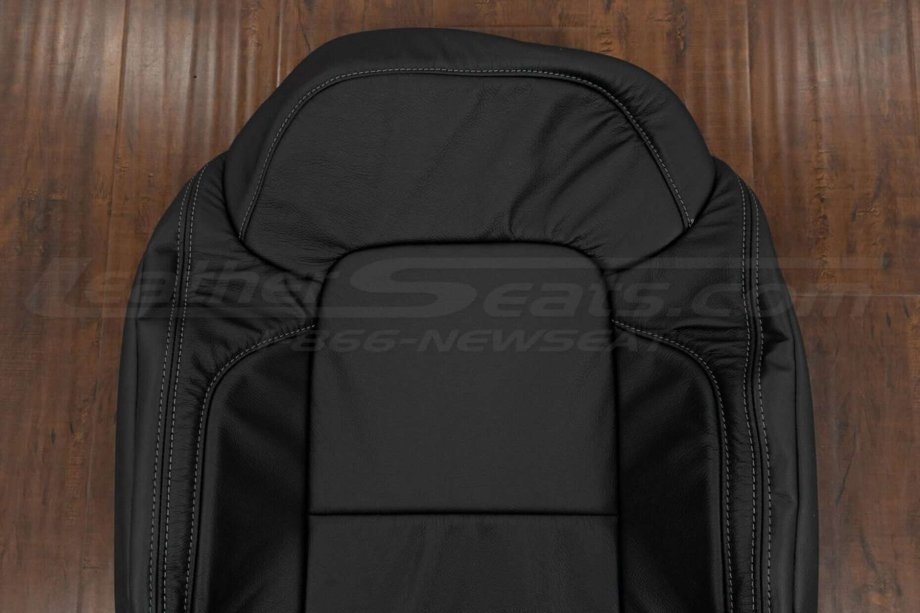 Upper section of backrest upholstery