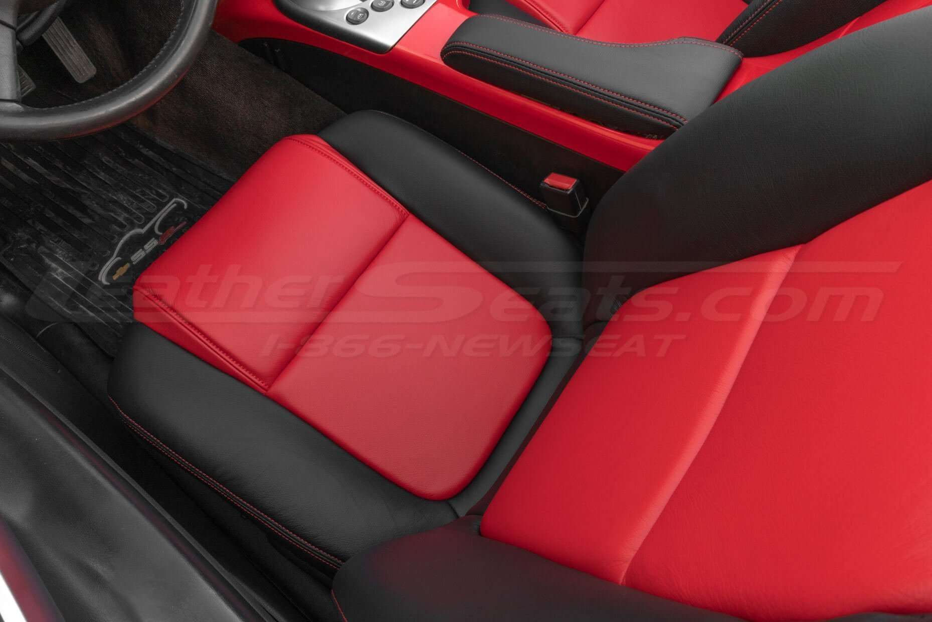 Top-down view of installed Chevy SSR Leather seats in Black and Bright Red