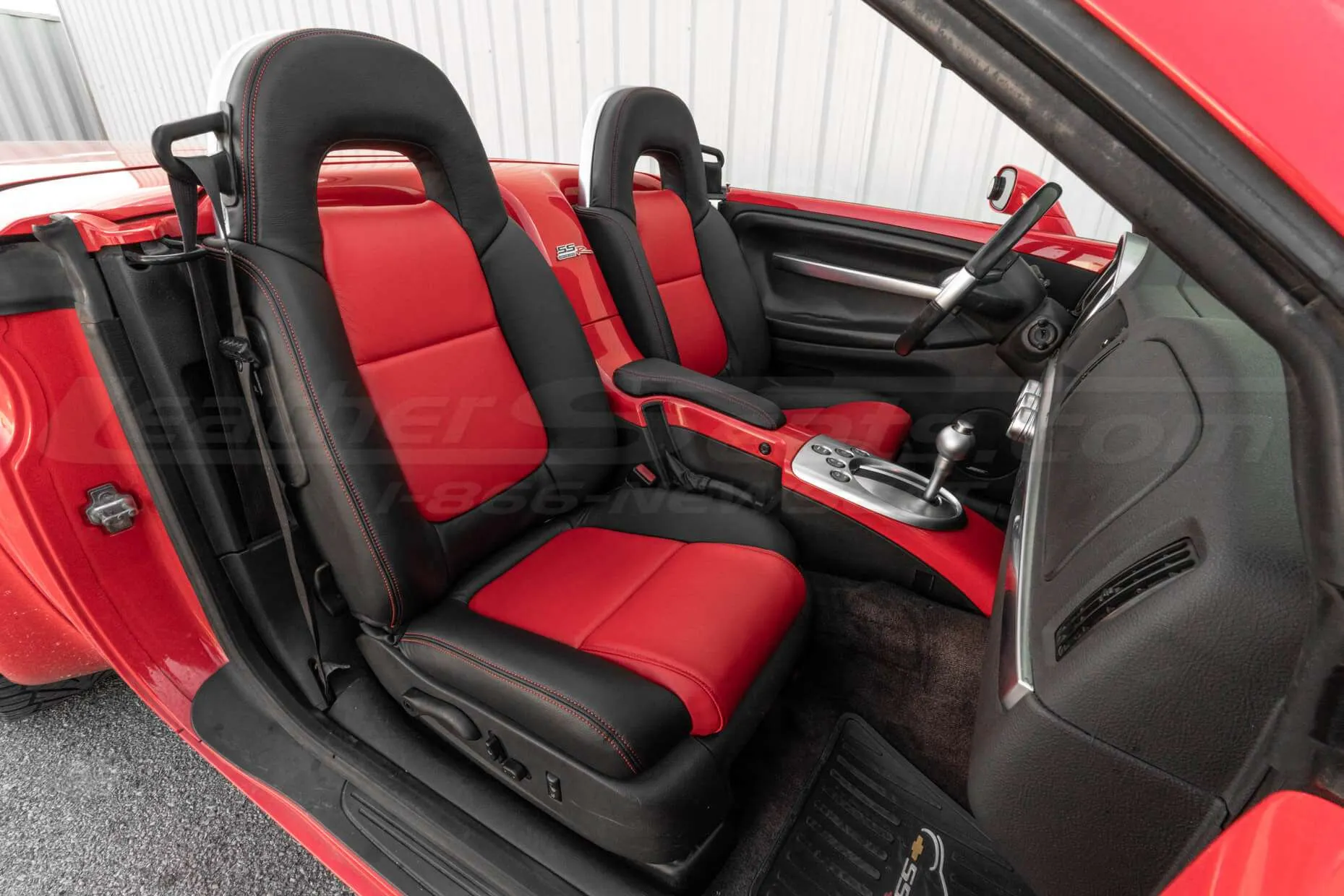 Installed leather seats in Black and Bright Red for Chevy SSR Convertible