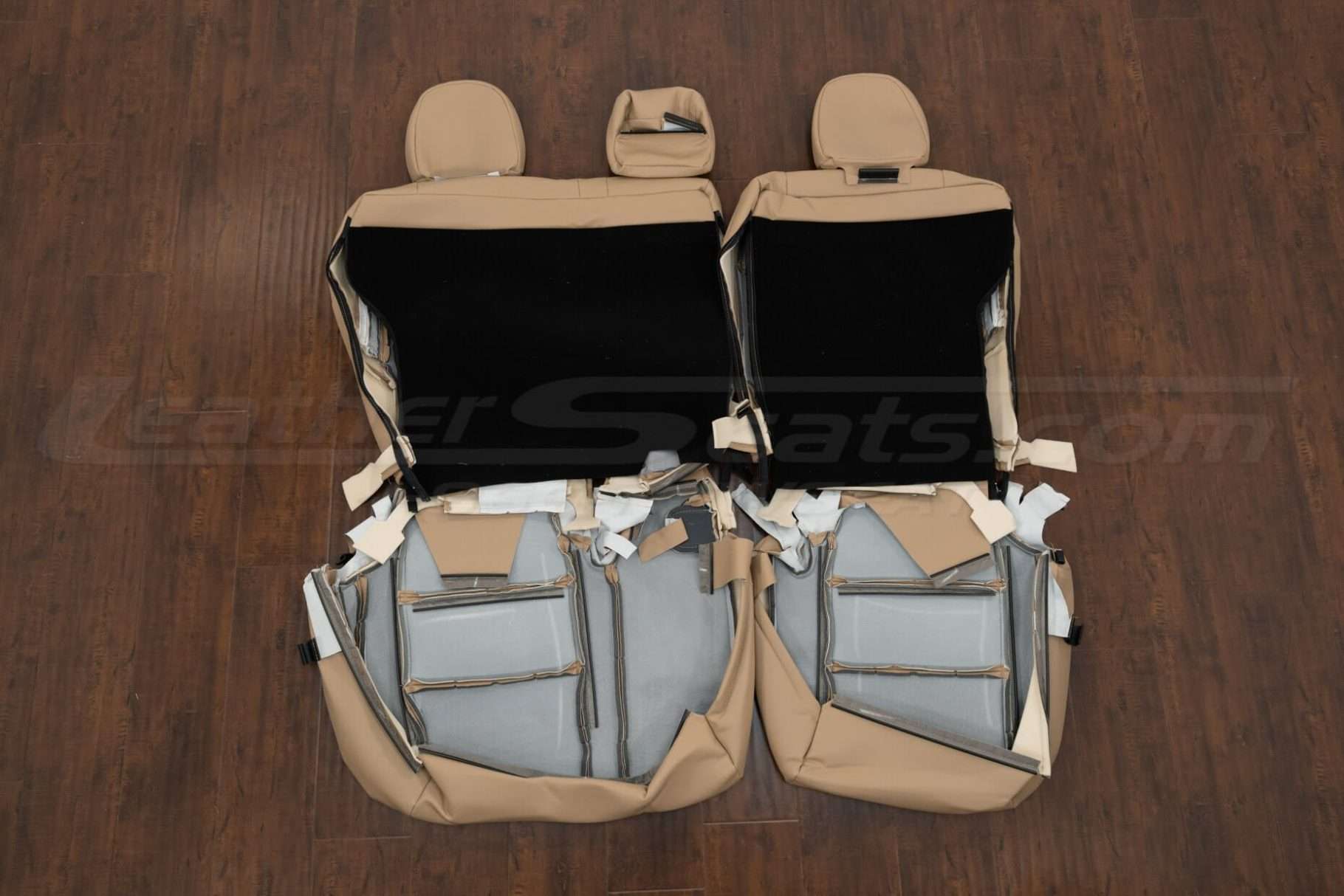 Rear seat upholstery flipped with Black carpet