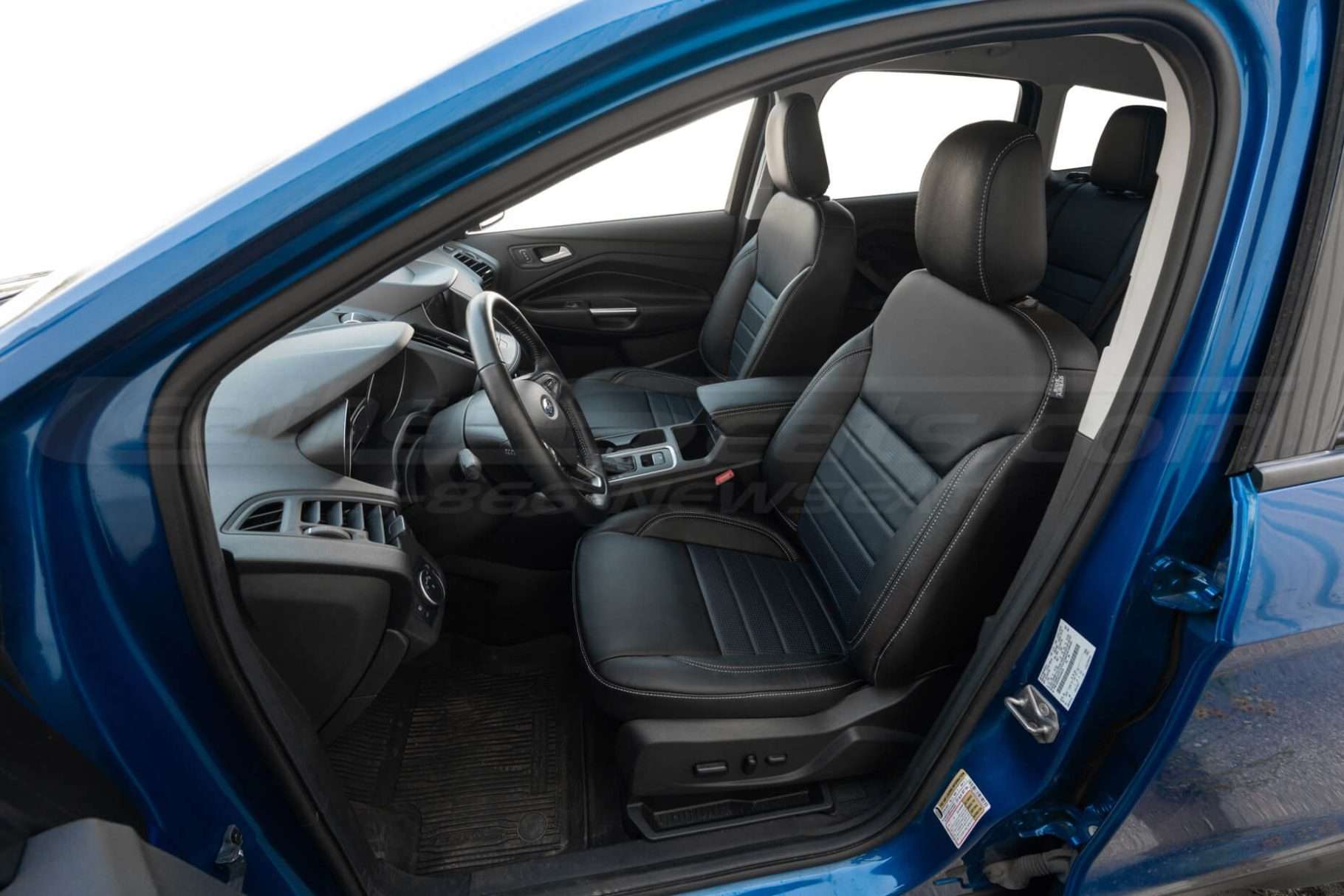 Ford Escape wotj Black and Blue perofrated leather seats