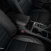 Passenger view of single-tone leather console lid cover for Ford Escape