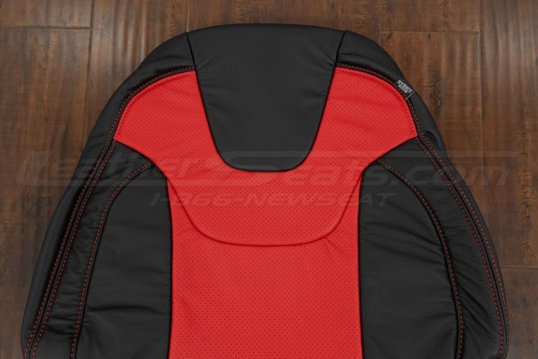 Upper section of front backrest upholstery