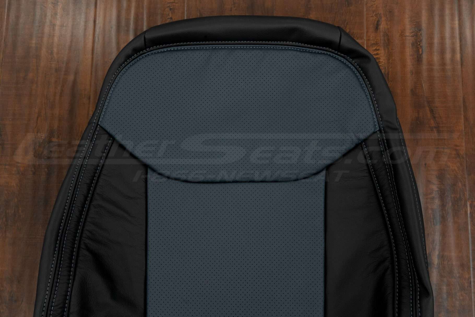 Upper section of front backrest upholstery