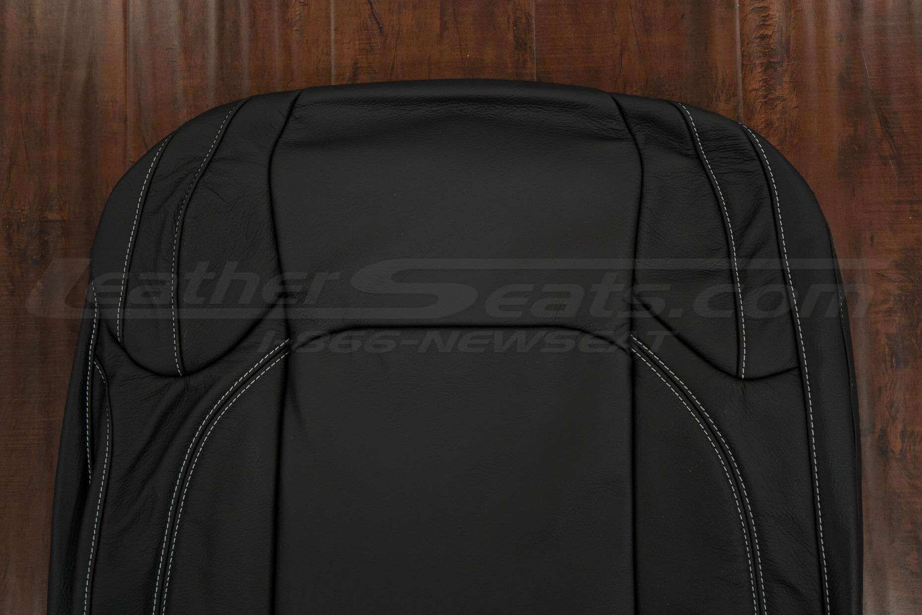 Upper section of Black backrest upholstery