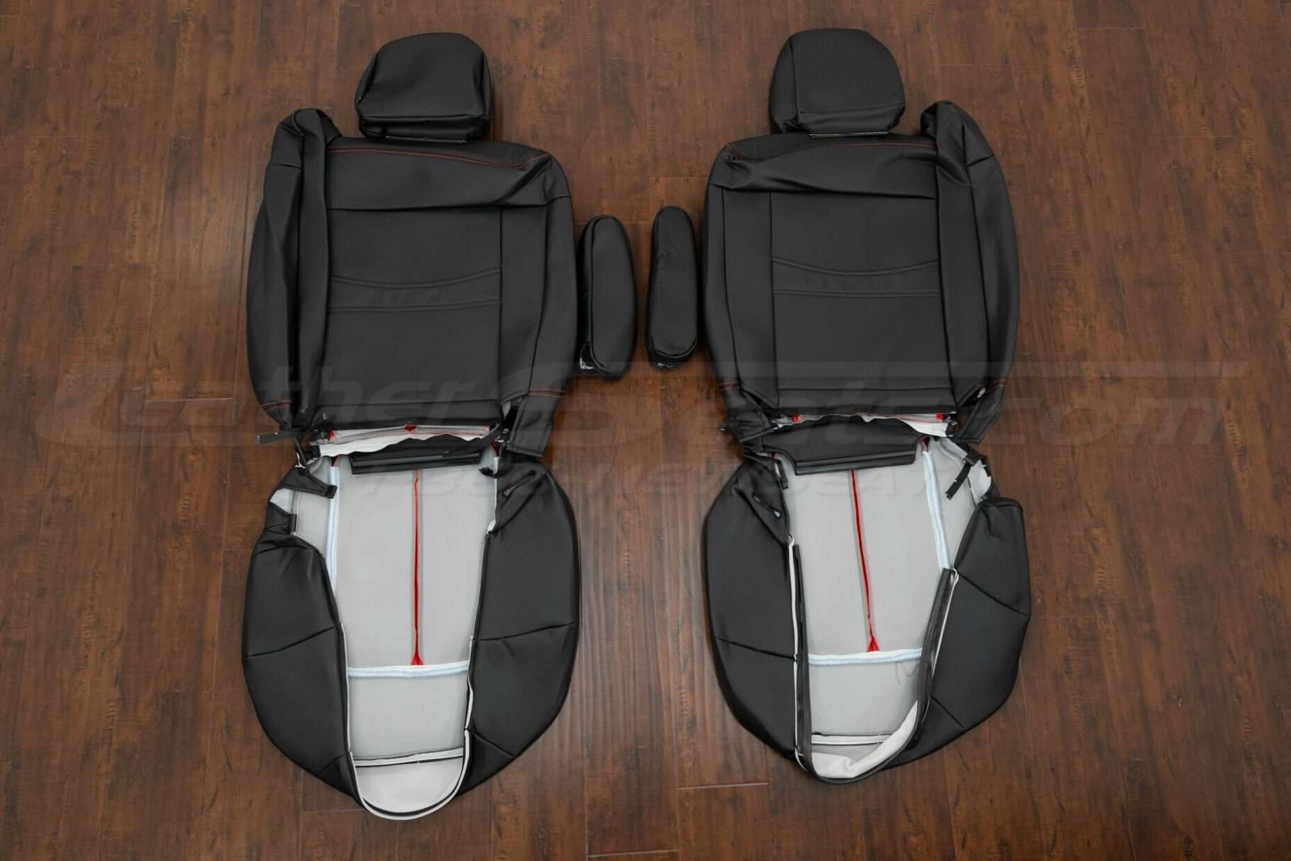 Back view of front seat uholstery and armrests