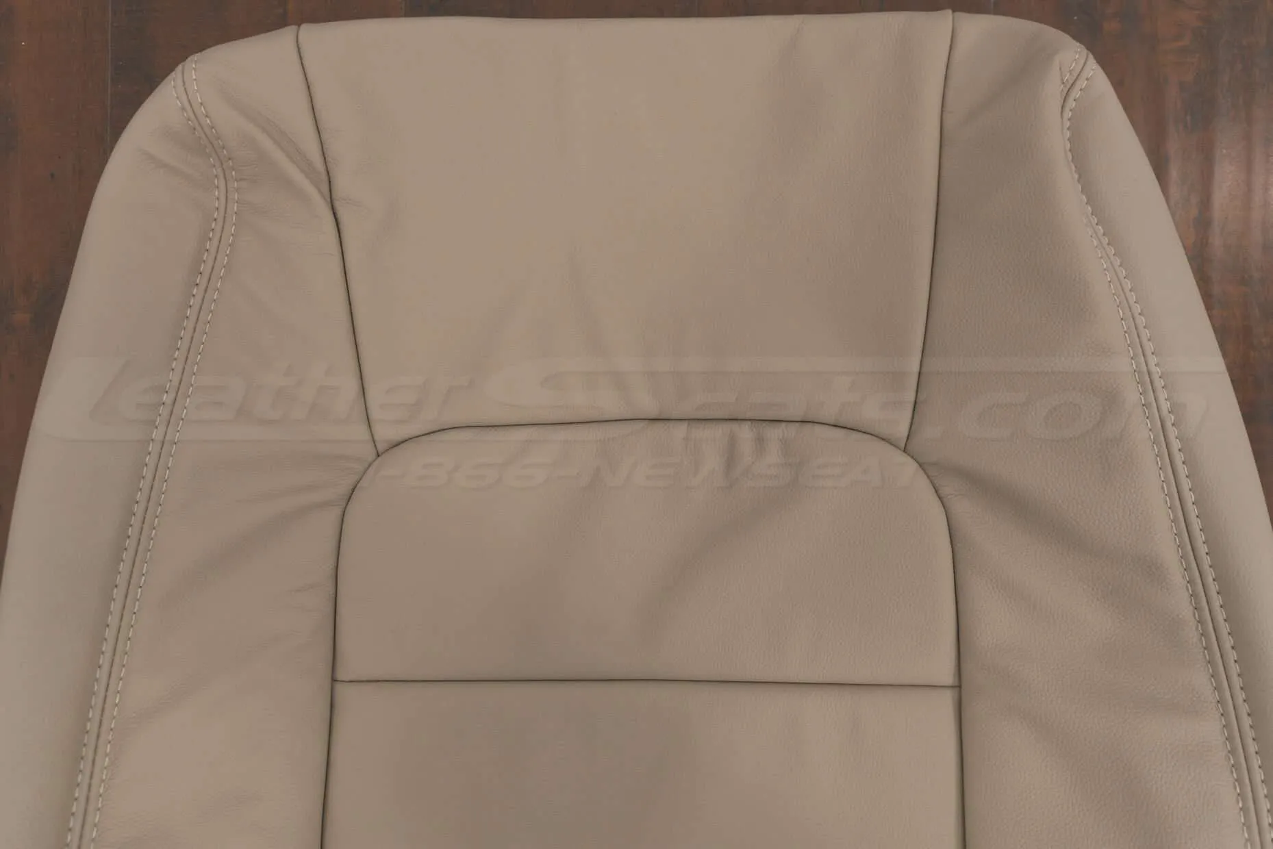 Upper section of front backrest upholstery