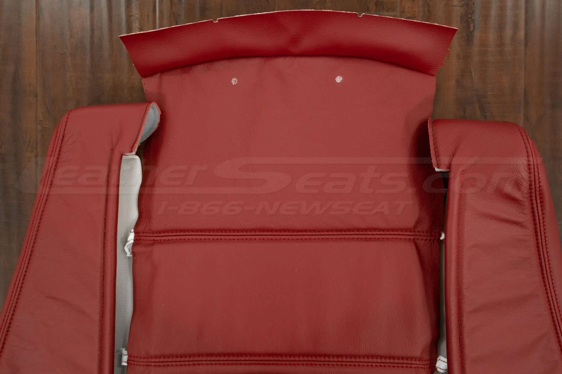 Upper section of front backrest upholstery