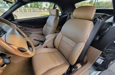 1994 Ford Mustang GT with installed leather seats - Featured Image