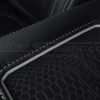 Sanctum Wireless Charging Console trim ring-stitching and leather texture close-up