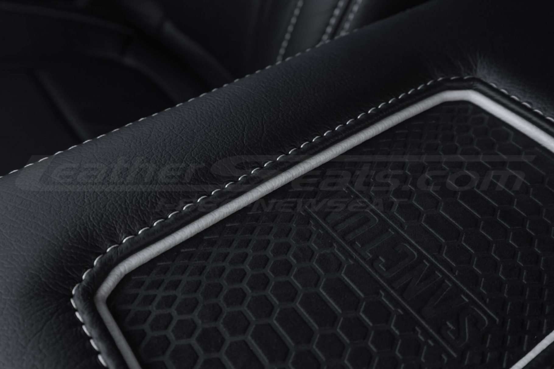 Sanctum Wireless Charging Console trim ring-stitching and leather texture close-up