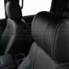 Front leather headrest with silver stitching close-up