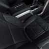Top-down view of front passenger seat with perforated inserts