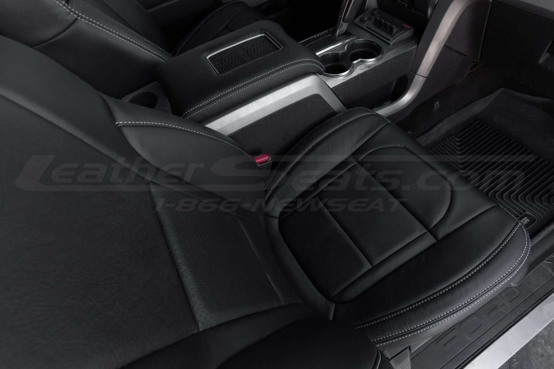 Top-down view of front passenger seat with perforated inserts