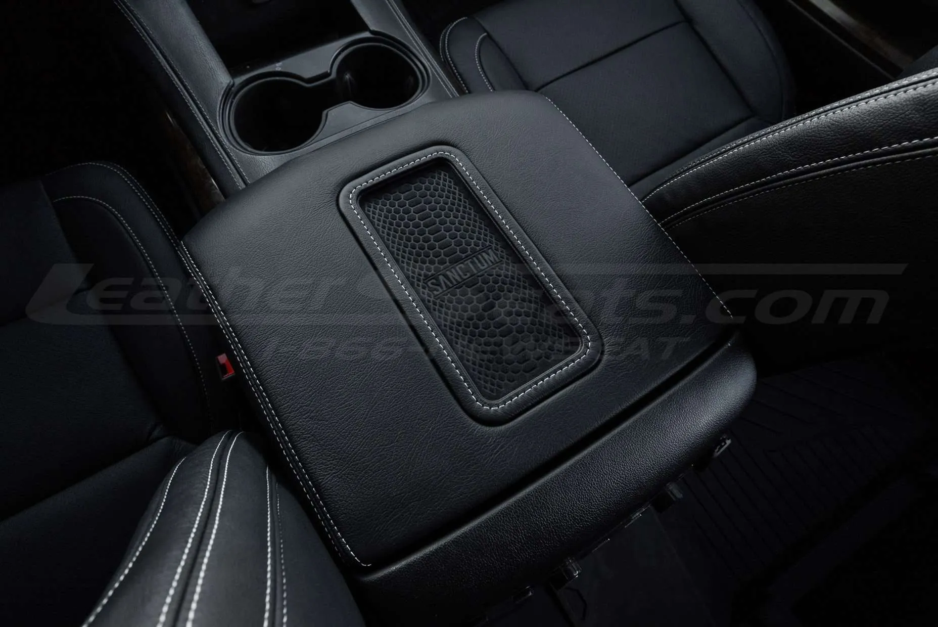 Close up of leather wireless charging center console
