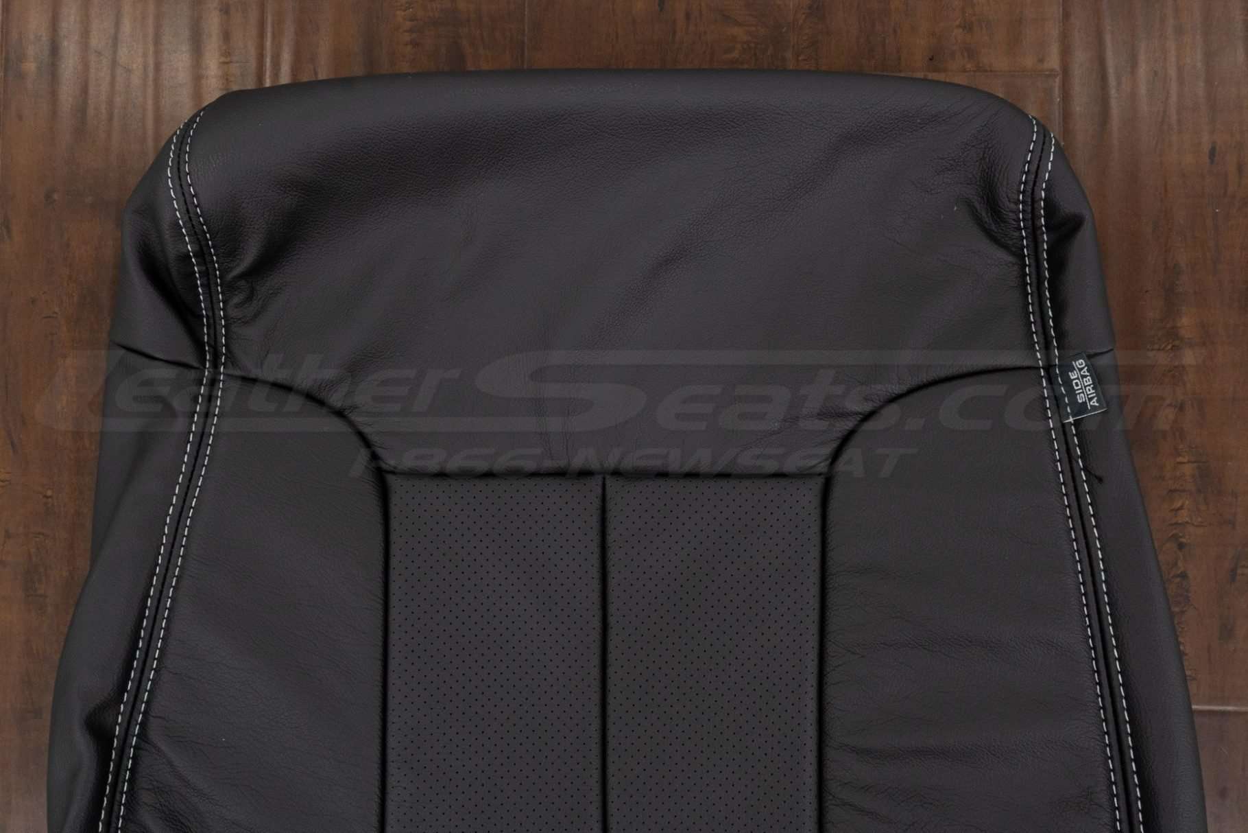 Upper section of backrest upholstery