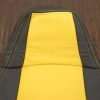 Upper section of front backrest with Velocity Yellow stitching