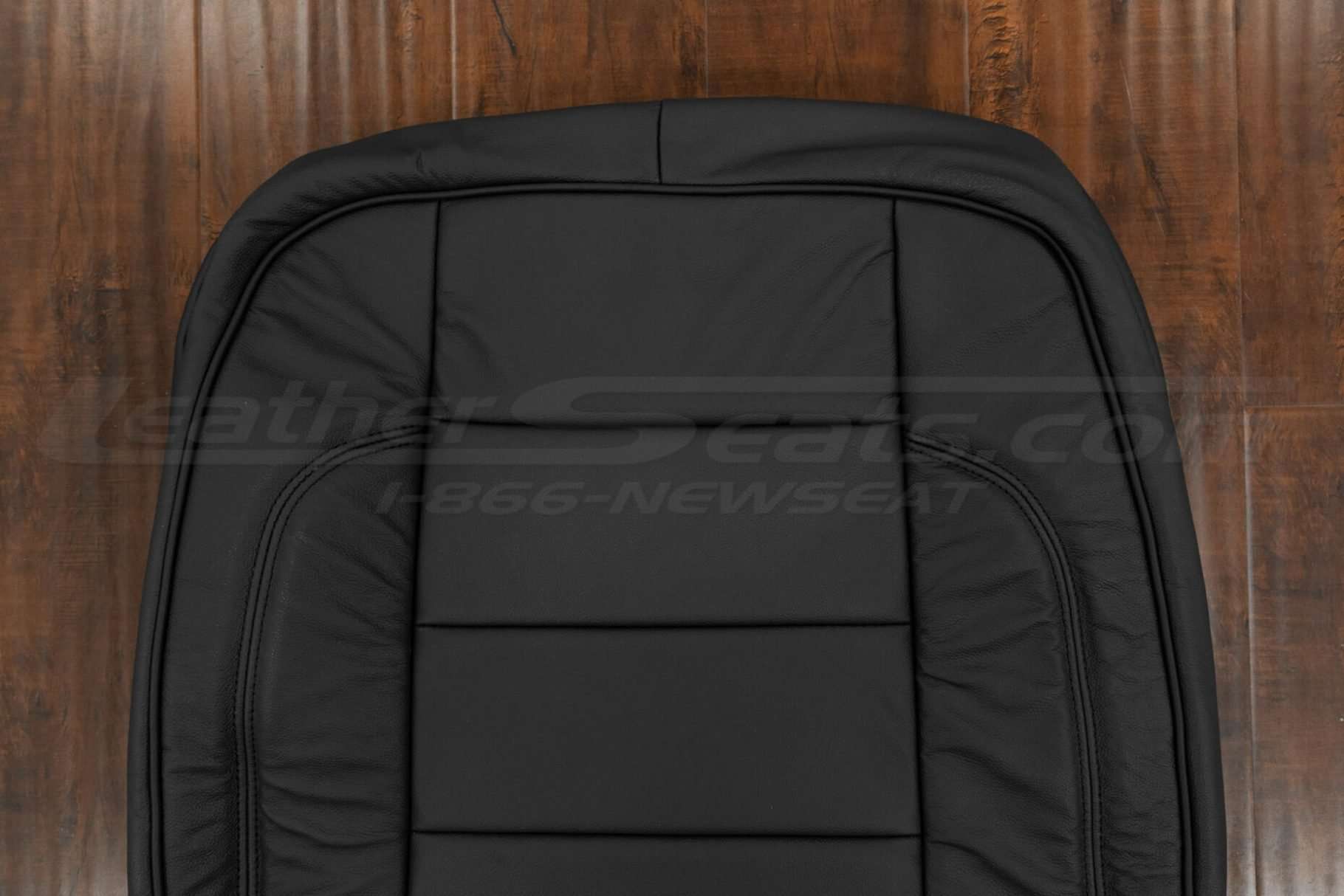 Upper section of Black backrest upholstery