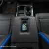 Top-down view of wireless Ford phone charging console - charging iPhone