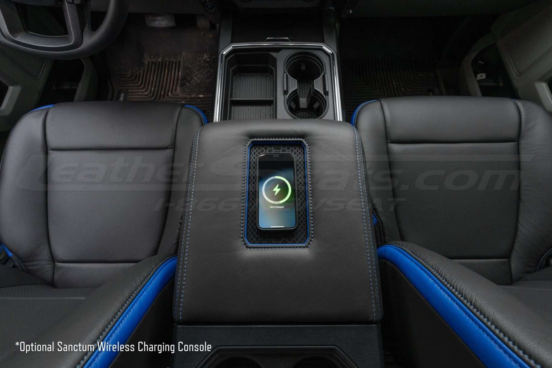 Top-down view of wireless Ford phone charging console - charging iPhone